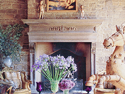 An elegant Italianate antique stone fireplace